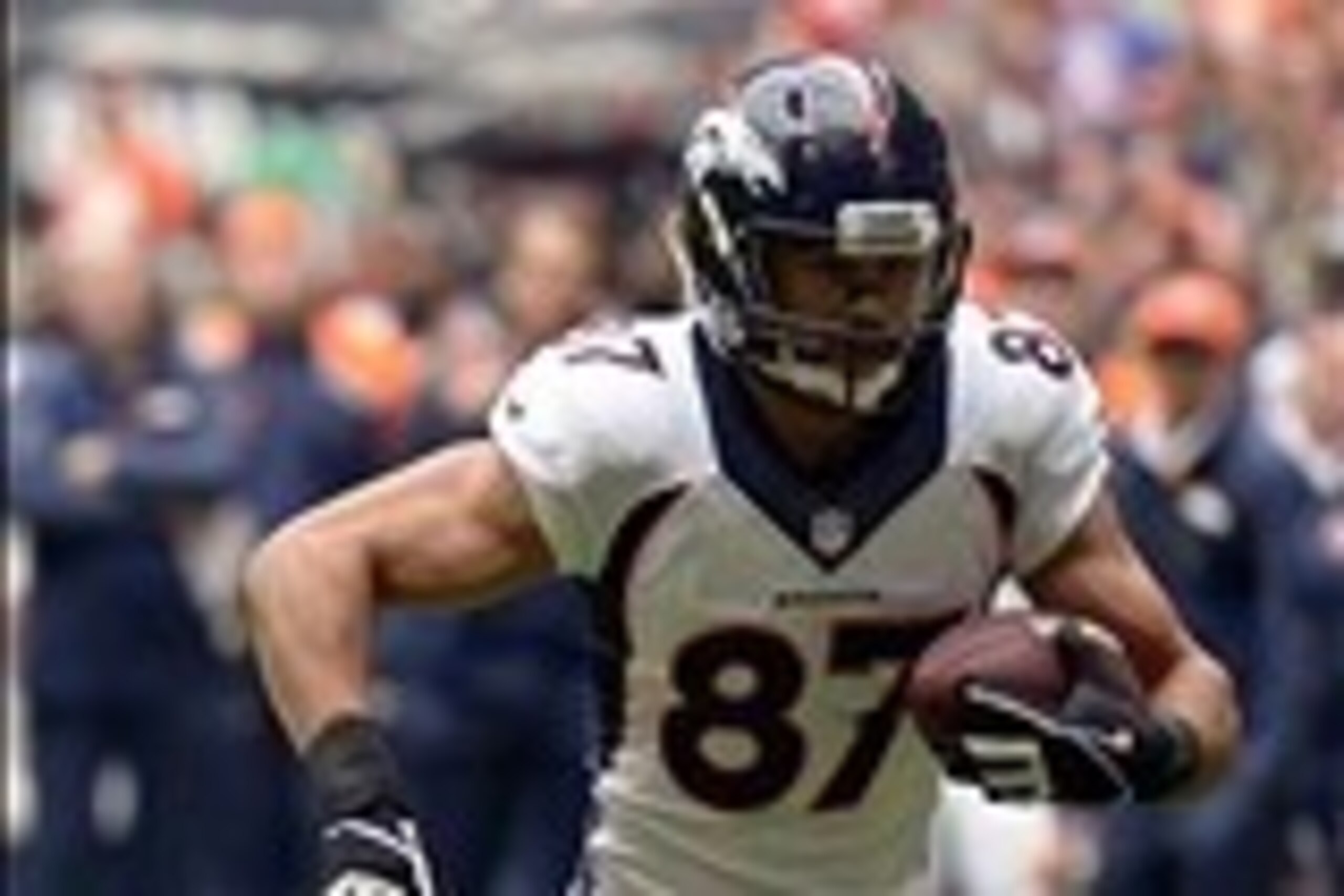 Dec 22, 2013; Houston, TX, USA; Denver Broncos wide receiver Eric Decker (87) runs after a catch against the Houston Texans during the first half at Reliant Stadium. Mandatory Credit: Thomas Campbell-USA TODAY Sports
