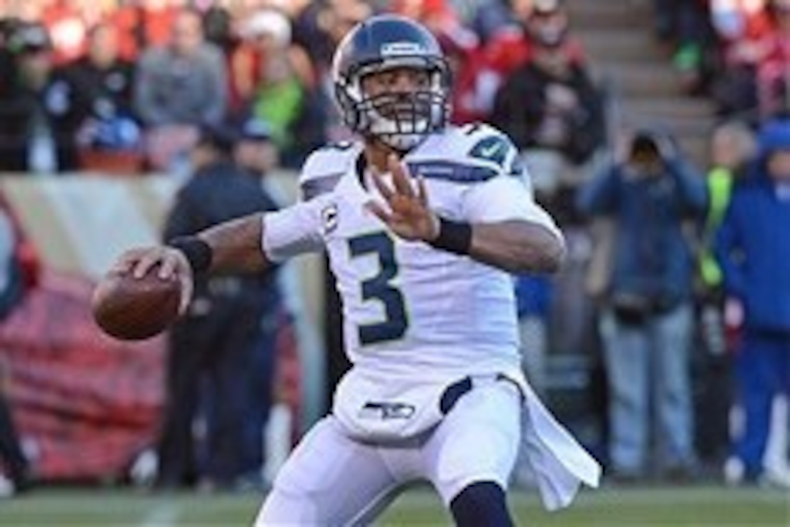December 8, 2013; San Francisco, CA, USA; Seattle Seahawks quarterback Russell Wilson (3) passes the football during the third quarter against the San Francisco 49ers at Candlestick Park. The 49ers defeated the Seahawks 19-17. Mandatory Credit: Kyle Terad