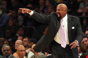NEW YORK, NY - DECEMBER 25: Head coach Mike Woodson of the New York Knicks yells at his players during the first half against the Oklahoma City Thunder  in an NBA basketball game at Madison Square Garden on December 25, 2013 in New York City. The Thunder 