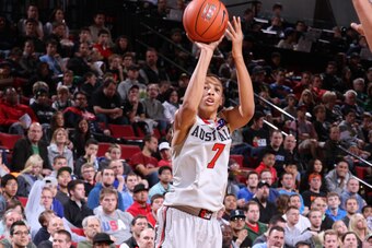 PORTLAND, OR - APRIL 20: Dante Exum #7 of the World Select Team shoots a three pointer against USA Junior Select Team during the 2013 Nike Hoop Summit game on April 20, 2013 at the Rose Garden Arena in Portland, Oregon. NOTE TO USER: User expressly acknow