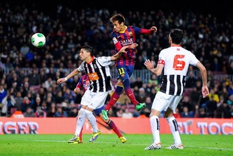 BARCELONA, SPAIN - DECEMBER 17:  Neymar of FC Barcelona scores his team's third goal during the Copa del Rey round of 32 second leg match between FC Barcelona and Cartagena at Camp Nou on December 17, 2013 in Barcelona, Spain.  (Photo by David Ramos/Getty