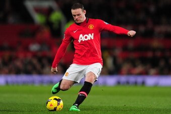 MANCHESTER, ENGLAND - DECEMBER 21:  Wayne Rooney of Manchester United in action during the Barclays Premier League match between Manchester United and West Ham United at Old Trafford on December 21, 2013 in Manchester, England.  (Photo by Stu Forster/Gett