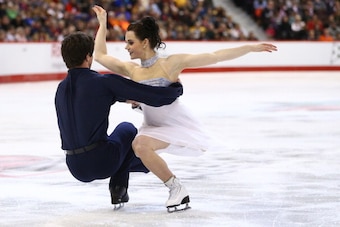 OTTAWA, ON - JANUARY 11: Tessa Virtue and Scott Moir skate in the Senior Ice Dance Free Dance during the 2014 Canadian Tire National Figure Skating Championships at Canadian Tire Centre on January 11, 2014 in Ottawa, Ontario, Canada.  (Photo by Andre Ring