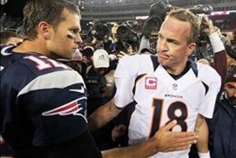 Oct 7, 2012; Foxborough, MA, USA; New England Patriots quarterback Tom Brady (12) shakes hands with Denver Broncos quarterback Peyton Manning (18) following the game at Gillette Stadium. The Patriots defeated the Broncos 31-21. Mandatory Credit: Stew Miln