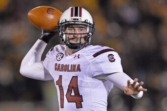 COLUMBIA, MO - OCTOBER 26:  Quarterback Connor Shaw #14 of the South Carolina Gamecocks drops back to pass against the Missouri Tigers during the second half on October 26, 2013 at Faurot Field/Memorial Stadium in Columbia, Missouri.  (Photo by Peter Aike