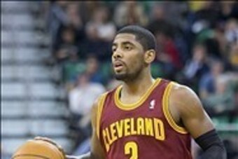 Jan 10, 2014; Salt Lake City, UT, USA; Cleveland Cavaliers point guard Kyrie Irving (2) dribbles up the court during the first half against the Utah Jazz at EnergySolutions Arena. Mandatory Credit: Russ Isabella-USA TODAY Sports