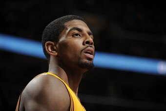 CLEVELAND, OH - DECEMBER 29:  Kyrie Irving #2 of the Cleveland Cavaliers during the game against the Golden State Warriors at The Quicken Loans Arena on December 29, 2013 in Cleveland, Ohio. NOTE TO USER: User expressly acknowledges and agrees that, by do
