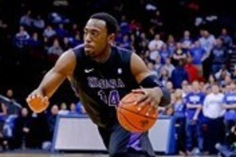 Nov 9, 2013; Newark, NJ, USA;  Niagara Purple Eagles guard Antoine Mason (14) drives to the basket during the first half against the Seton Hall Pirates at Prudential Center. Mandatory Credit: Jim O'Connor-USA TODAY Sports
