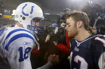 FOXBORO, MA - JANUARY 18:  Quarterback Tom Brady #12 of the New England Patriots and quarterback Peyton Manning #18 of the Indianapolis Colts greet each other on the field after the AFC Championship Game on January 18, 2004 at Gillette Stadium in Foxboro,