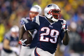 FOXBORO, MA - JANUARY 11:  LeGarrette Blount #29 of the New England Patriots runs a 73 yard touchdown in the fourth quarter against the Indianapolis Colts during the AFC Divisional Playoff game at Gillette Stadium on January 11, 2014 in Foxboro, Massachus