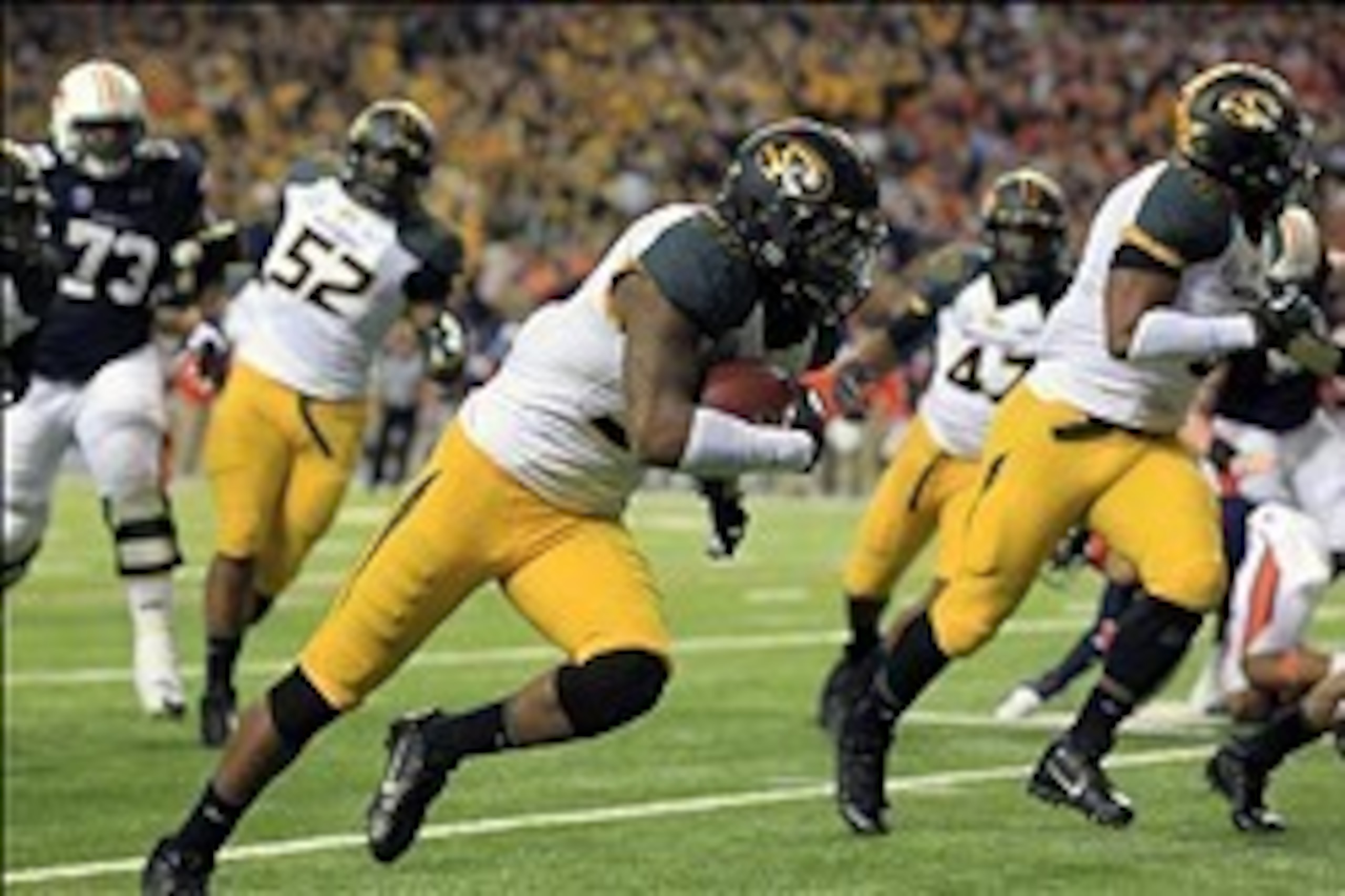Dec 7, 2013; Atlanta, GA, USA; Missouri Tigers defensive back E.J. Gaines (31) returns a fumble by Auburn Tigers quarterback Nick Marshall (not pictured) for a touchdown in the second quarter during the 2013 SEC Championship game at Georgia Dome.. Mandato