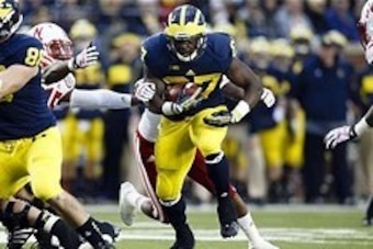 Nov 9, 2013; Ann Arbor, MI, USA; Michigan Wolverines running back Derrick Green (27) runs the ball against the Nebraska Cornhuskers in the second quarter at Michigan Stadium. Mandatory Credit: Rick Osentoski-USA TODAY Sports