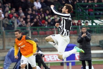 CAGLIARI, ITALY - JANUARY 12:  Claudio Marchisio  of Juventus celebrated the goal 1-2  during the Serie A match between Cagliari Calcio and Juventus at Stadio Sant'Elia on January 12, 2014 in Cagliari, Italy.  (Photo by Enrico Locci/Getty Images)