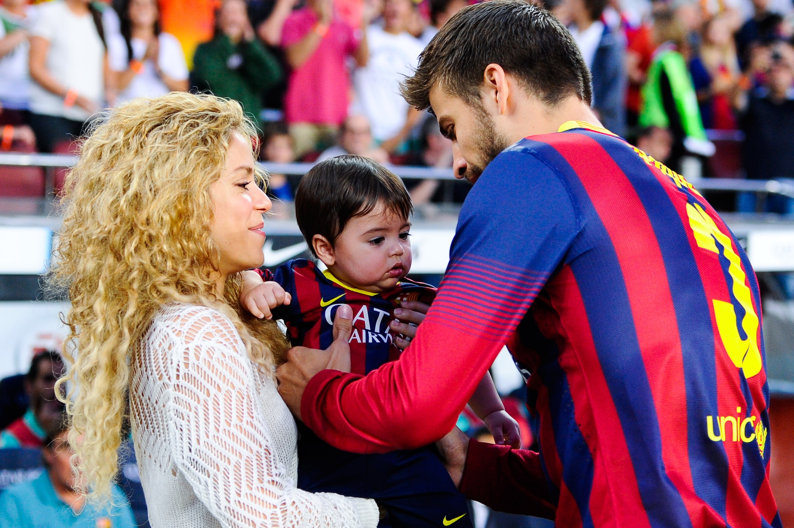 Pique with his wife Shakira and their son, Milan
