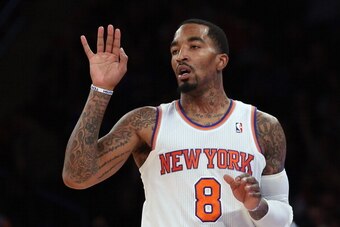 NEW YORK, NY - DECEMBER 11: J.R. Smith #8 of the New York Knicks sinks a basket against the Chicago Bulls at Madison Square Garden on December 11, 2013 in New York City. The Knicks defeated the Bulls 83-78. NOTE TO USER: User expressly acknowledges and ag