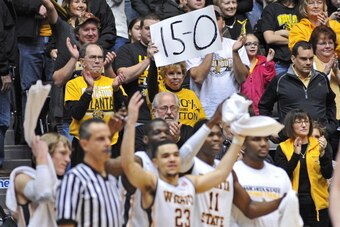 WICHITA, KS - JANUARY 05:  Wichita State Shockers fans celebrate as the Shockers improve to 15-0 on the season with a win over the Northern Iowa Panthers on January 5, 2014 at Charles Koch Arena in Wichita, Kansas.  Wichita State defeated Northern Iowa 67