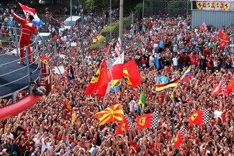 MONZA, ITALY - SEPTEMBER 08:  Fernando Alonso of Spain and Ferrari celebrates on the podium after finishing second during the Italian Formula One Grand Prix at Autodromo di Monza on September 8, 2013 in Monza, Italy.  (Photo by Mark Thompson/Getty Images)
