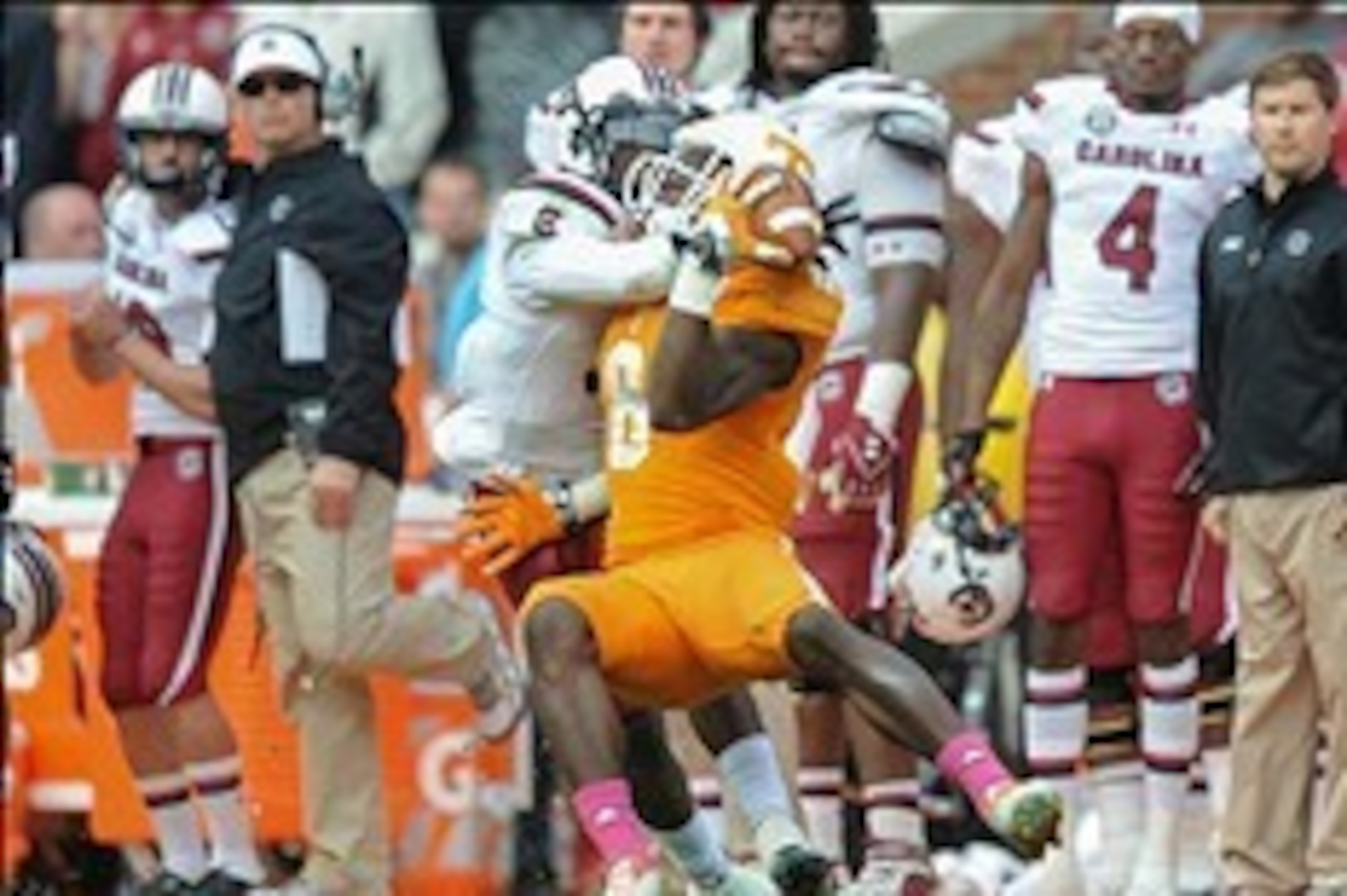 Oct 19, 2013; Knoxville, TN, USA; Tennessee Volunteers wide receiver Marquez North (8) catches a pass while being defended by South Carolina Gamecocks cornerback Ahmad Christian (4) during the second half at Neyland Stadium. Tennessee won 23 to 21.  Manda