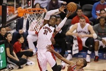 Jan 13, 2014; Toronto, Ontario, CAN; Toronto Raptors guard Terrence Ross (31) misses an attempted alley-oop against the Milwaukee Bucks at Air Canada Centre. Mandatory Credit: Tom Szczerbowski-USA TODAY Sports