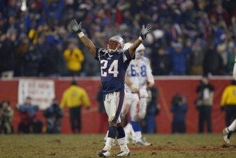 FOXBORO, MA - JANUARY 18:  Ty Law #24 of the New England Patriots celebrates during the AFC Championship Game against the Indianapolis Colts at Gillette Stadium on January 18, 2004 in Foxboro, Massachusetts. The Patriots defeated the Colts 24-14. (Photo b