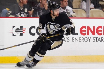 PITTSBURGH, PA - DECEMBER 21:  Brandon Sutter #16 of the Pittsburgh Penguins skates against the Calgary Flames on December 21, 2013 at Consol Energy Center in Pittsburgh, Pennsylvania.  (Photo by Gregory Shamus/NHLI via Getty Images)