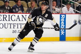 PITTSBURGH, PA - DECEMBER 21:  Pascal Dupuis #9 of the Pittsburgh Penguins skates against the Calgary Flames on December 21, 2013 at Consol Energy Center in Pittsburgh, Pennsylvania.  (Photo by Gregory Shamus/NHLI via Getty Images)