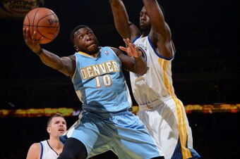 OAKLAND, CA - JANUARY 15: Nate Robinson #10 of the Denver Nuggets taking a shot during a game against the Golden State Warriors on January 15, 2014 at the Oracle Aren in Oakland, California. NOTE TO USER: User expressly acknowledges and agrees that, by do