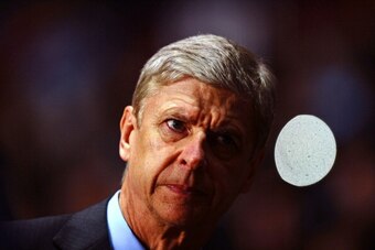 BIRMINGHAM, ENGLAND - JANUARY 13:  Arsene Wenger manager of Arsenal looks on during the Barclays Premier League match between Aston Villa and Arsenal at Villa Park on January 13, 2014 in Birmingham, England.  (Photo by Laurence Griffiths/Getty Images)