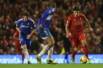 LIVERPOOL, ENGLAND - JANUARY 01:  Luis Suarez of Liverpool in action during the Barclays Premier League match between Liverpool and Hull City at Anfield on January 1, 2014 in Liverpool, England.  (Photo by Clive Brunskill/Getty Images)
