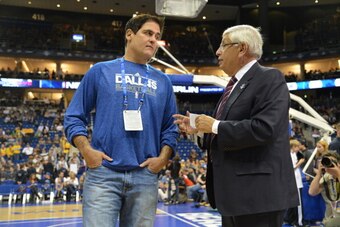 BERLIN, GERMANY - OCTOBER 6:   NBA commissioner David Stern (R) greets Dallas Mavericks owner Mark Cuban during the game between the Dallas Mavericks and the Alba Berlin at the O2 Arena for NBA Europe Live 2012 on October 6, 2012  in Berlin, Germany. NOTE