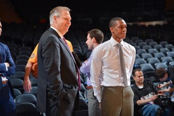 NEW YORK, NY - APRIL 20: Danny Ainge, president of Basketball Operations for the Boston Celtics, left, stands on court with Rajon Rondo #9 before Game One of the Eastern Conference Quarterfinals between the Celtics and New York Knicks during the 2013 NBA 