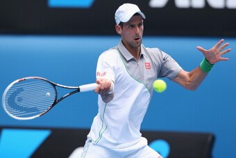 MELBOURNE, AUSTRALIA - JANUARY 15:  Novak Djokovic of Serbia plays a forehand in his second round match against Leonardo Mayer of Argentina during day three of the 2014 Australian Open at Melbourne Park on January 15, 2014 in Melbourne, Australia.  (Photo
