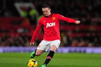 MANCHESTER, ENGLAND - DECEMBER 21:  Wayne Rooney of Manchester United in action during the Barclays Premier League match between Manchester United and West Ham United at Old Trafford on December 21, 2013 in Manchester, England.  (Photo by Stu Forster/Gett