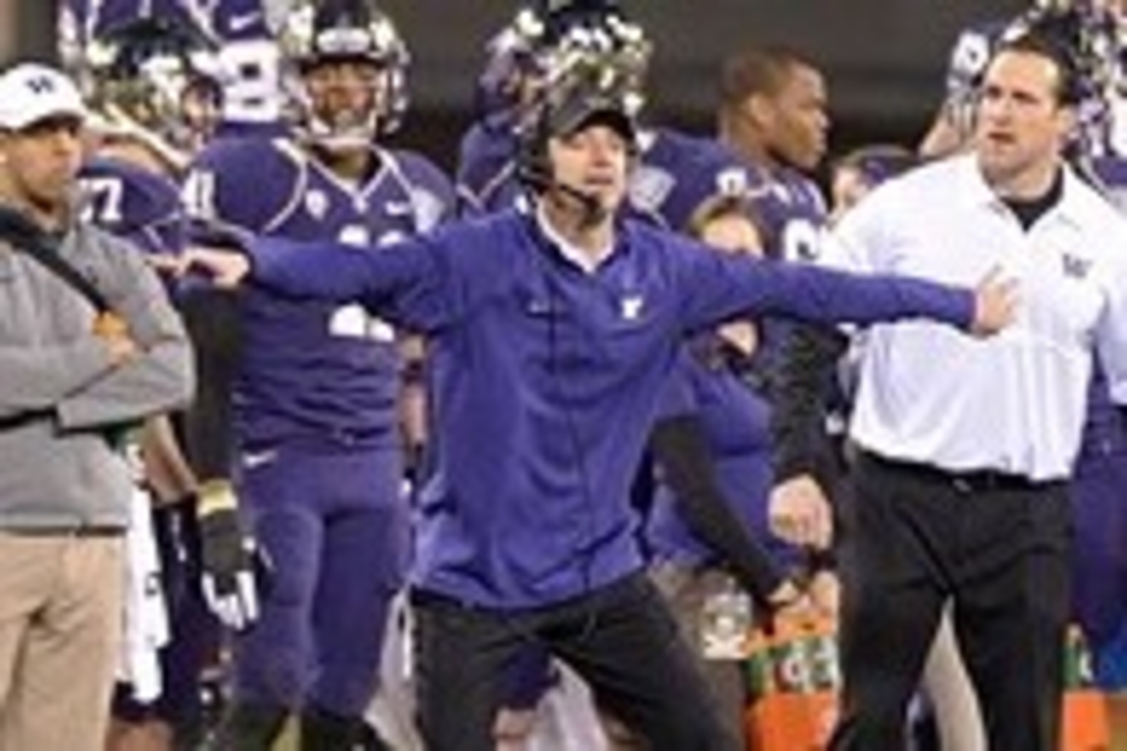 Dec 27, 2013; San Francisco, CA, USA; Washington Huskies defensive coordinator Justin Wilcox reacts during the 2013 Fight Hunger Bowl against the BYU Cougars at AT&T Park. Washington defeated BYU 31-16. Mandatory Credit: Kirby Lee-USA TODAY Sports Dec 27, 2013; San Francisco, CA, USA; Washington Huskies defensive coordinator Justin Wilcox reacts during the 2013 Fight Hunger Bowl against the BYU Cougars at AT&T Park. Washington defeated BYU 31-16. Mandatory Credit: Kirby Lee-USA TODAY Sports