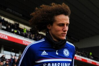 DERBY, ENGLAND - JANUARY 05:  David Luiz of Chelsea heads out to warm up prior to the Budweiser FA Cup Third Round match between Derby County and Chelsea at iPro Stadium on January 5, 2014 in Derby, England.  (Photo by Michael Regan/Getty Images)