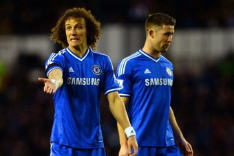 DERBY, ENGLAND - JANUARY 05:  David Luiz of Chelsea and Gary Cahill of Chelsea in action during the Budweiser FA Cup Third Round match between Derby County and Chelsea at iPro Stadium on January 5, 2014 in Derby, England.  (Photo by Michael Regan/Getty Im