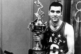 ST. LOUIS - 1965:  Jerry Lucas of the Cincinnatti Royals wins the Most Valuable Player Trophy for the 1965 NBA All-Star Game in St. Louis, Missouri.  NOTE TO USER: User expressly acknowledges and agrees that, by downloading and/or using this Photograph, U
