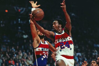 RICHFIELD, OH - FEBRUARY 1:  Moses Malone #24 of the Eastern Conference All-Stars goes for a layup against the Western Conference All Stars during the 1981 NBA All-Star Game on February 1, 1981 in Richfield, Ohio. NOTE TO USER: User expressly acknowledges
