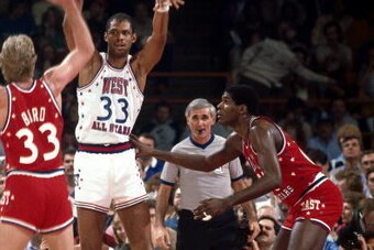 EAST RUTHERFORD, NJ - JANUARY 31:  Kareem Abdul-Jabbar #33 of the Western Conference  All-Stars passes to a teammate as he double teamed by Eastern Conference All-Stars Hakeem Olajuwon #34 and Larry Bird #33  during the 1982 NBA All-Star game on Jan, 31,