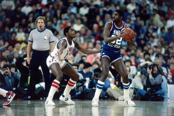 INDIANAPOLIS - FEBRUARY 10:  Magic Johnson #32 of the Western Conference All-Stars looks to pass against the Isiah Thomas #11 of the Eastern Conference All-Stars during the 1985 NBA All-Star game at Market Square Arena on February 10, 1985 in Indianapolis