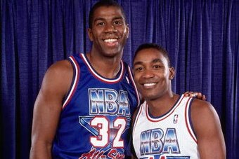 CHARLOTTE, NC - FEBRUARY 10:  Isiah Thomas #11 of the Eastern Conference All-Stars poses for a portrait with Earvin 'Magic' Johnson #32 of the Western Conference after the NBA All-Star game at the Charlotte Coliseum on February 10, 1991 in Charlotte, Nort