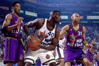 PHOENIX - FEBRUARY 12:  Shawn Kemp #40 of the Western Conference All-Stars makes a move to basket against Reggie Miller #31 and Scottie Pippen of the Eastern Conference All-Stars during the 1995 NBA All-Star Game played February 12, 1995 at America West A