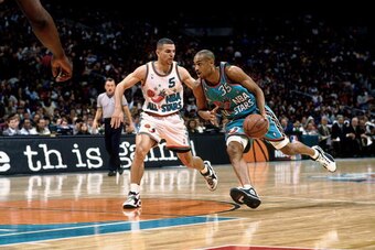 SAN ANTONIO - FEBRUARY 11:  Grant Hill #35 of the Eastern Conference All-Stars drives to the basket against Jason Kidd #5 of the Western Conference All-Stars during the 1996 NBA All-Star game played February 11, 1996 at the Alamodome in San Antonio, Texas