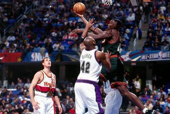 CLEVELAND, OH - FEBRUARY 9:  Shawn Kemp #40 of the Western Conference shoots against Vin Baker #42 of the Eastern Conference during the 1997 All-Star Game on February 9, 1997 at Gund Arena in Cleveland, Ohio.  NOTE TO USER: User expressly acknowledges tha