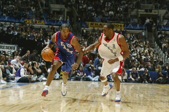 LOS ANGELES - FEBRUARY 15:  Michael Redd #22 of the Eastern Conference All-Stars drives around Kobe Bryant #8 of the Western Conference All-Stars during the 2004 NBA All-Star Game, part of the 53rd NBA All-Star weekend, at Staples Center on February 15, 2