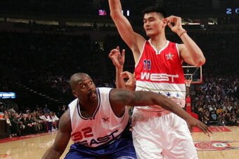 HOUSTON - FEBRUARY 18: Shaquille O'Neal #34 of the East Team looks to shoot over Yao Ming #11 of the West Team at the 2006 NBA All-Star Game during NBA All-Star Weekend at the Toyota Center on February 19, 2006 in Houston, Texas. The East defeated the Wes