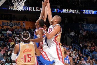 NEW ORLEANS - FEBRUARY 17:  Tim Duncan #21 of the Western Conference shoots over Chirs Bosh #4 of the Eastern Conference during the 2008 NBA All-Star Game part of 2008 NBA All-Star Weekend at the New Orleans Arena on February 17, 2008 in New Orleans, Loui