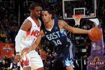 PHOENIX - FEBRUARY 15:  Devin Harris #34 of the Eastern Conference moves the ball as he is covered by Chris Paul #3 of the Western Conference during the 58th NBA All-Star Game, part of 2009 NBA All-Star Weekend, at US Airways Center on February 15, 2009 i