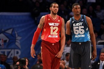 ORLANDO, FL - FEBRUARY 26:  LaMarcus Aldridge #24 of the Portland Trail Blazers and the Western and Roy Hibbert #55 of the Indiana Pacers and the Eastern Conference look on during the 2012 NBA All-Star Game at the Amway Center on February 26, 2012 in Orla
