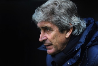 NEWCASTLE UPON TYNE, ENGLAND - JANUARY 12:  Manchester City manager Manuel Pellegrini looks on before the Barclays Premier League match between Newcastle United and Manchester City at St James' Park on January 12, 2014 in Newcastle upon Tyne, England.  (P